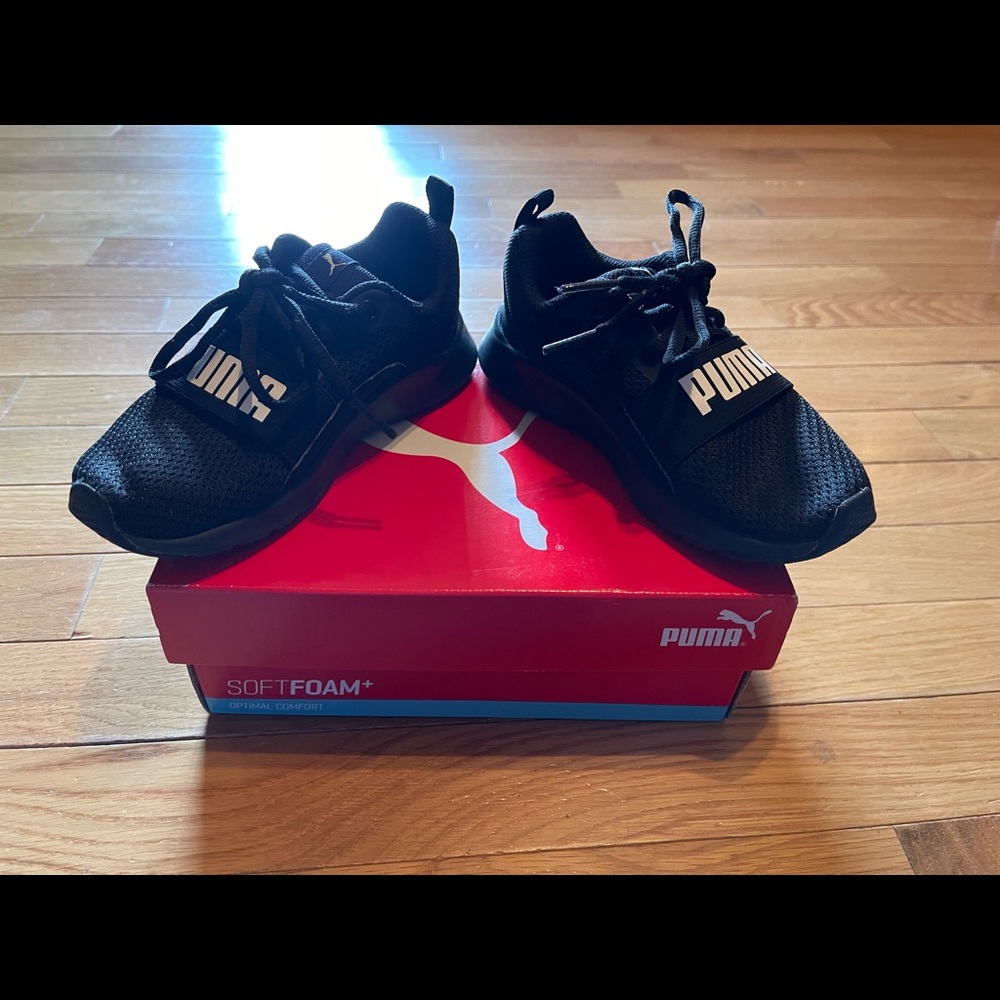 Almost brand new black Puma Wired PS size 12c kids shoes.
